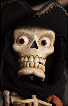 Image source: Screenshot from the television adaptation of the Candle Cove Creepypasta, "Channel Zero". <a href="https://antifandom.com/candlecove/wiki/Jawbone" title="External link" target="_blank">https://antifandom.com/candlecove/wiki/Jawbone</a> The Skin-Taker